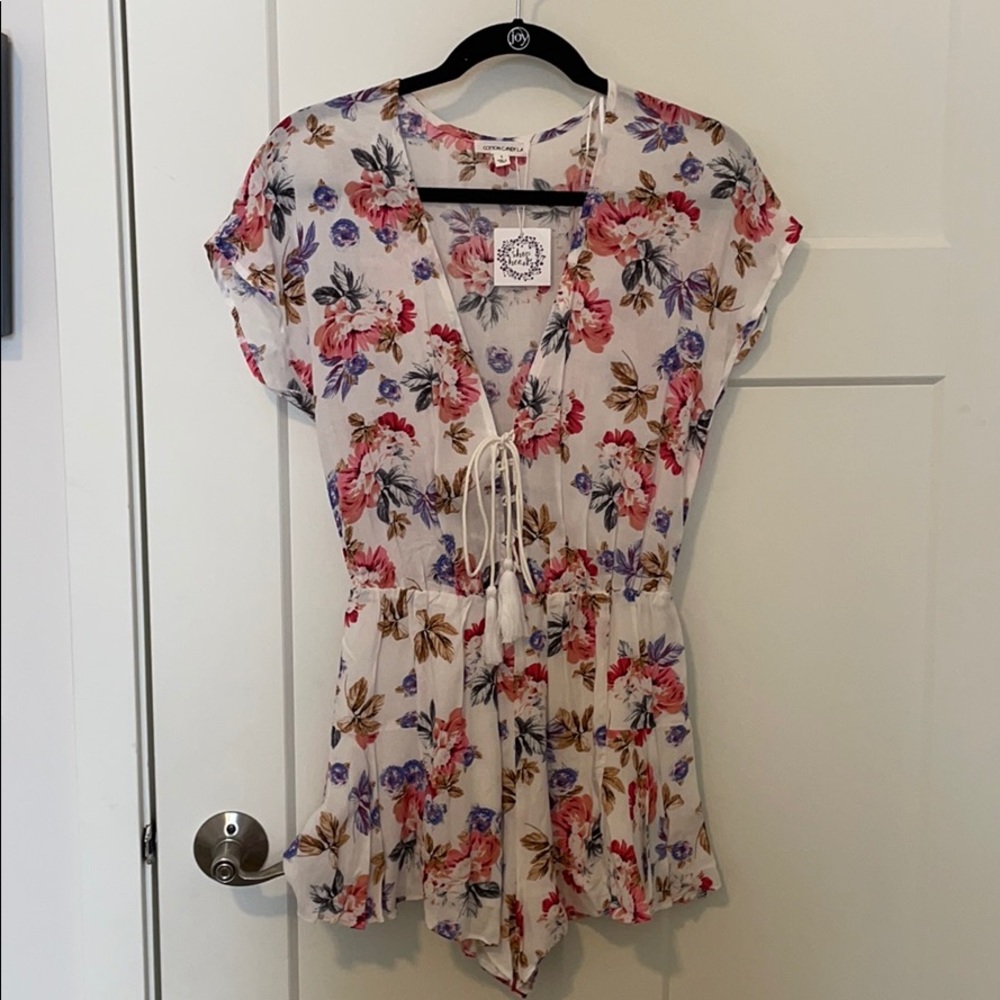 Flower Romper. Size: S. BRAND NEW. COTTON CANDY LA
